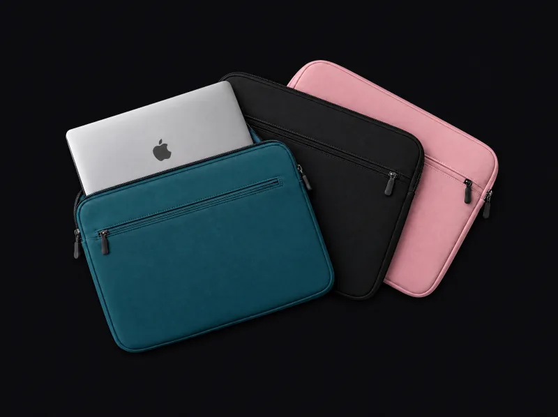 Fundas para MacBook en turquesa, negro y rosado, con un MacBook Air dentro de una